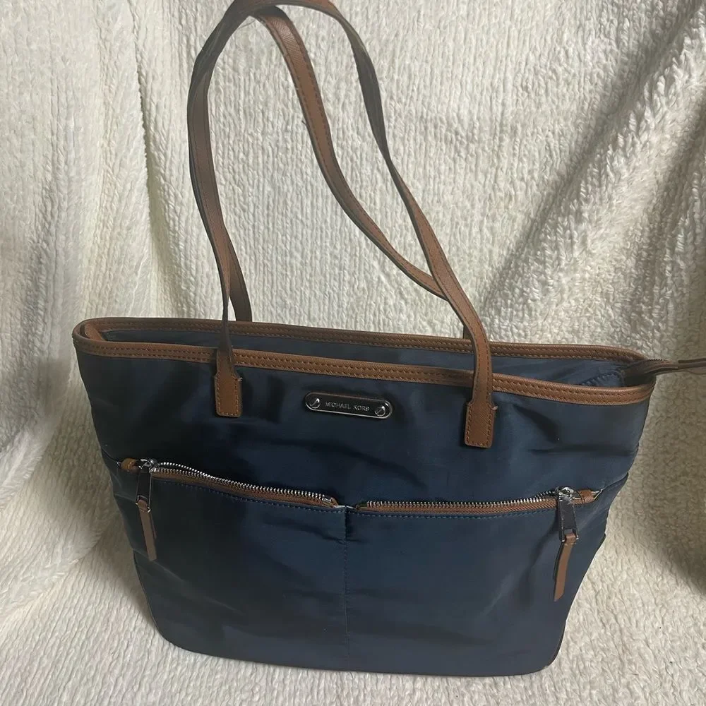 Michael Kors  Nylon Navy Blue Tote with leather Brown Trim and straps ..